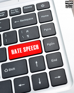 Toetsenbord met een extra rode toets met de tekst Hate speech erop.